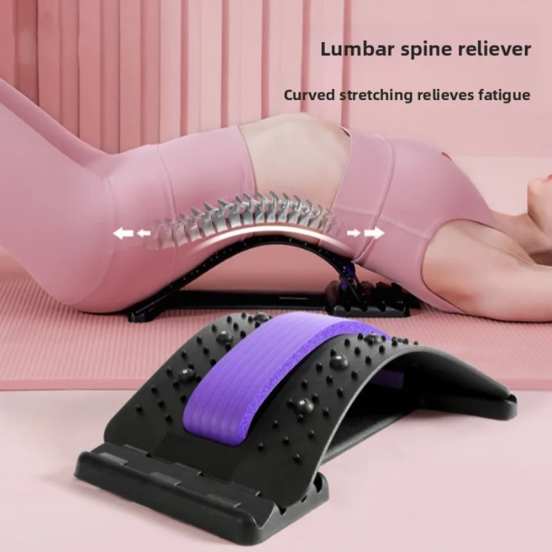 Person lying on a pink mat using a curved lumbar spine reliever to stretch the back and relieve fatigue.